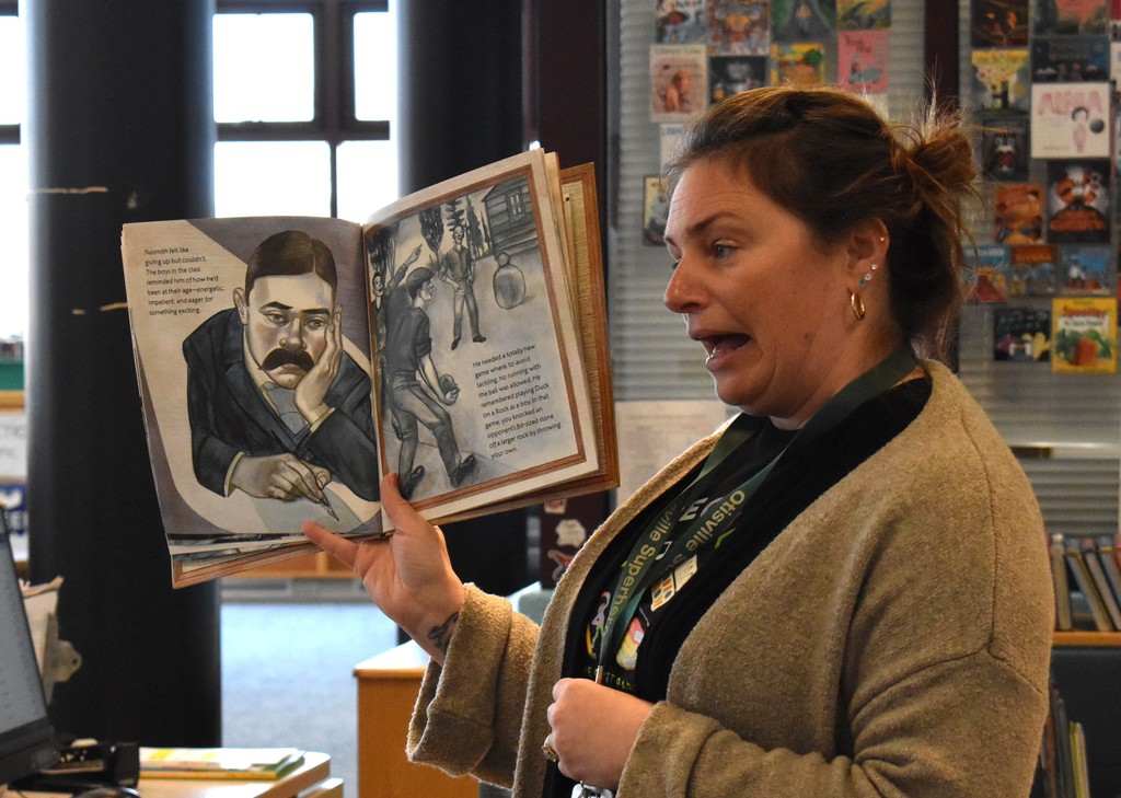 teacher reading to students