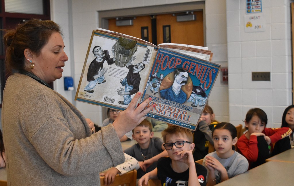 teacher reading to students