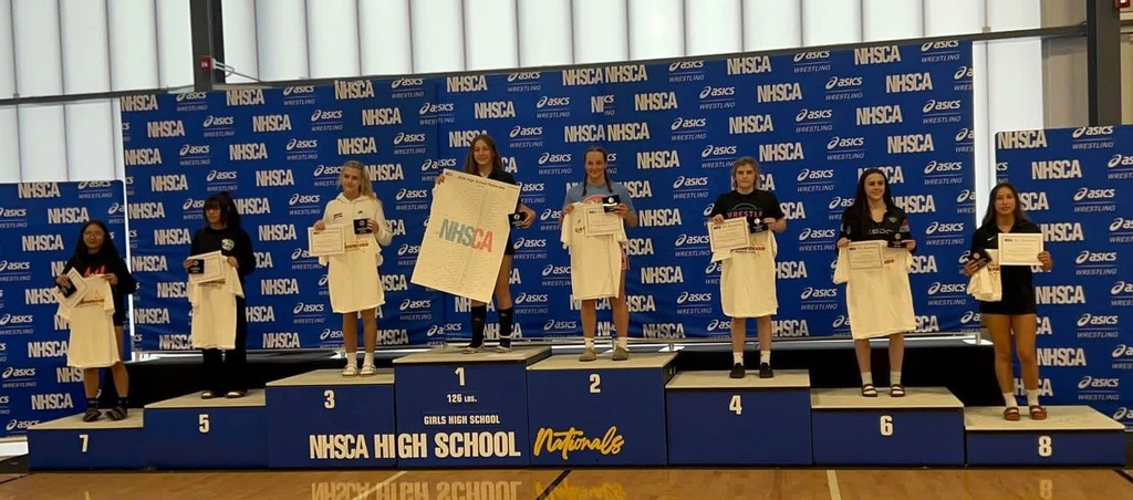 wrestlers on podium