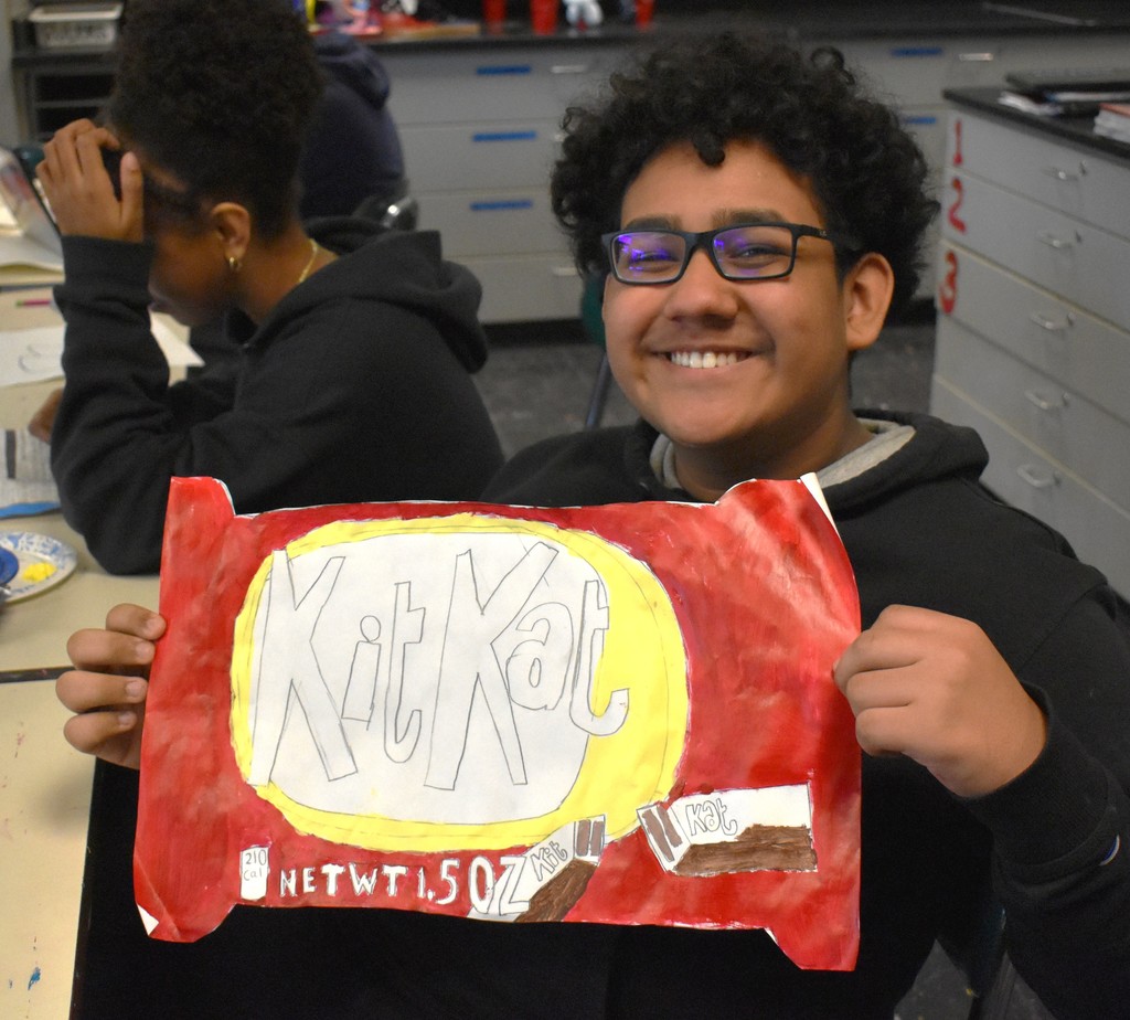 student in art class