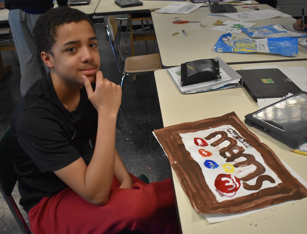 student in art class