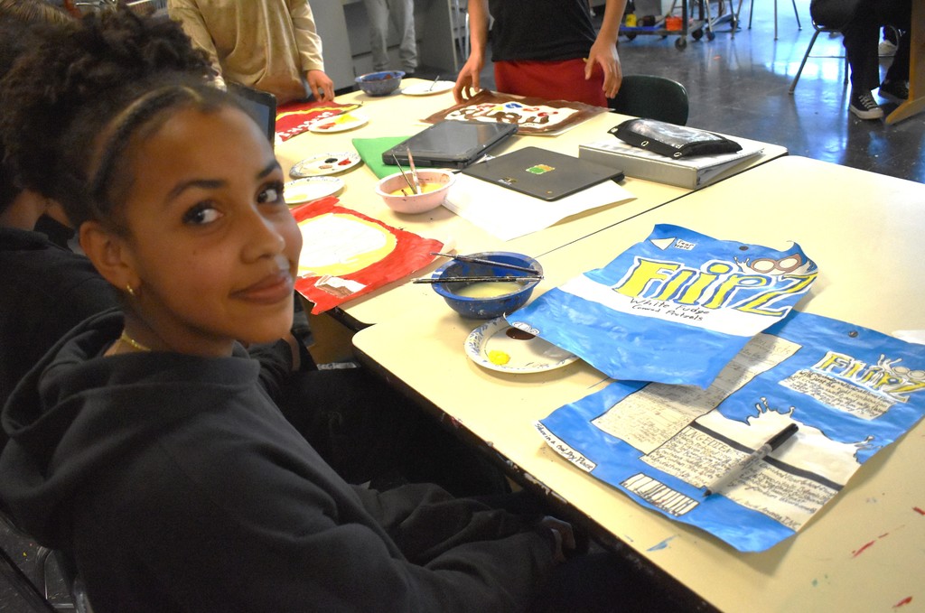 student in art class