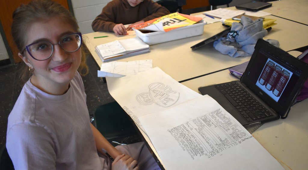 student in art class