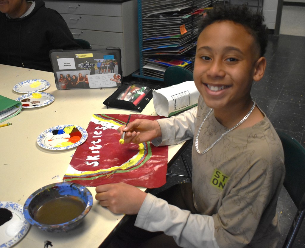 student in art class