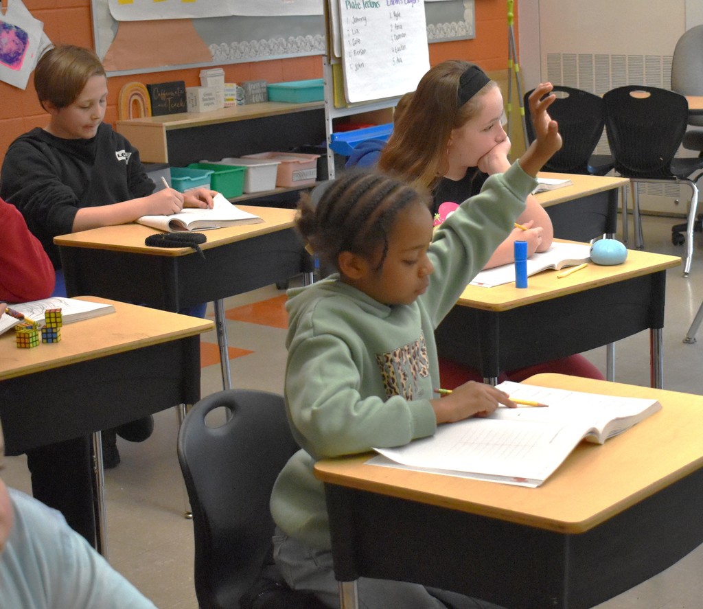 student in math class