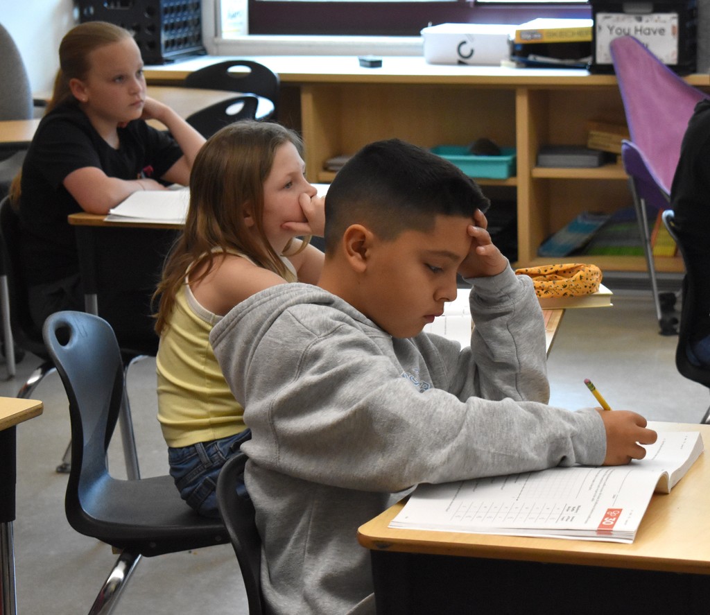 student in math class