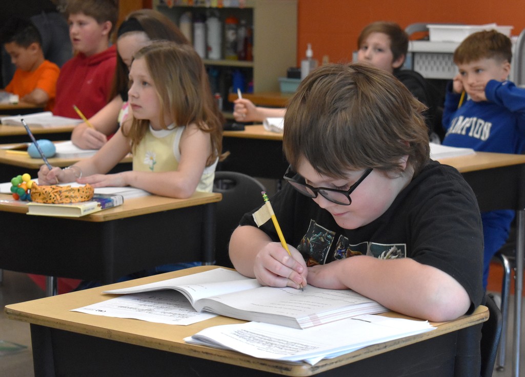 student in math class