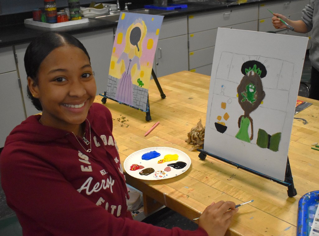 student in art class