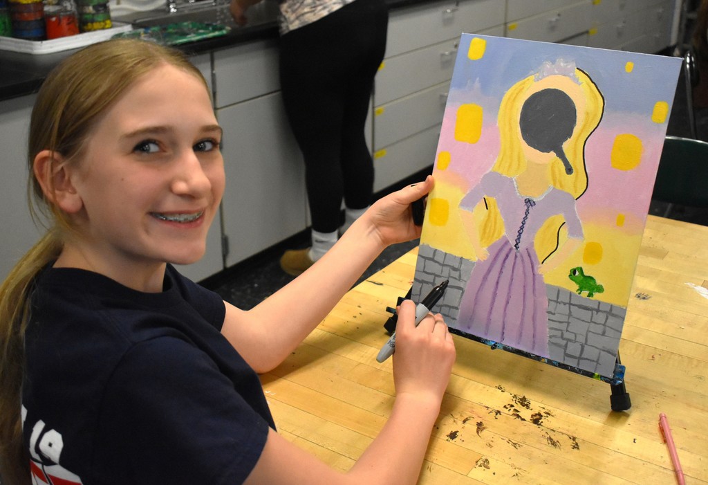 student in art class