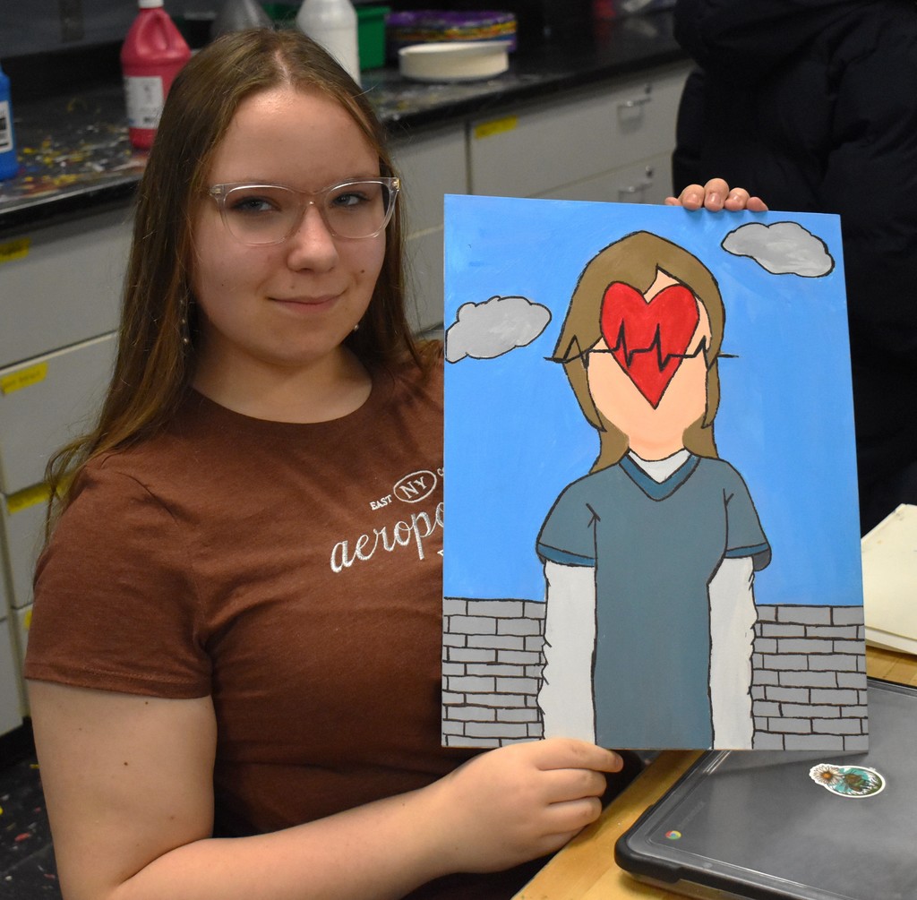 student in art class
