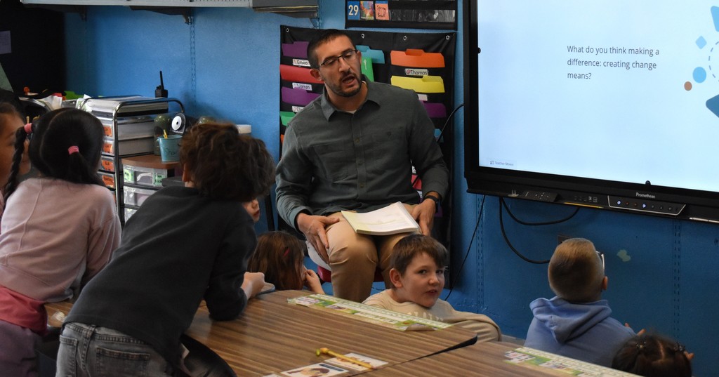 students and teacher in class