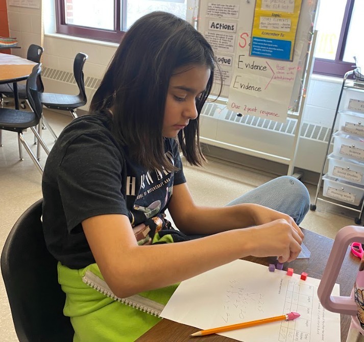 student in science class