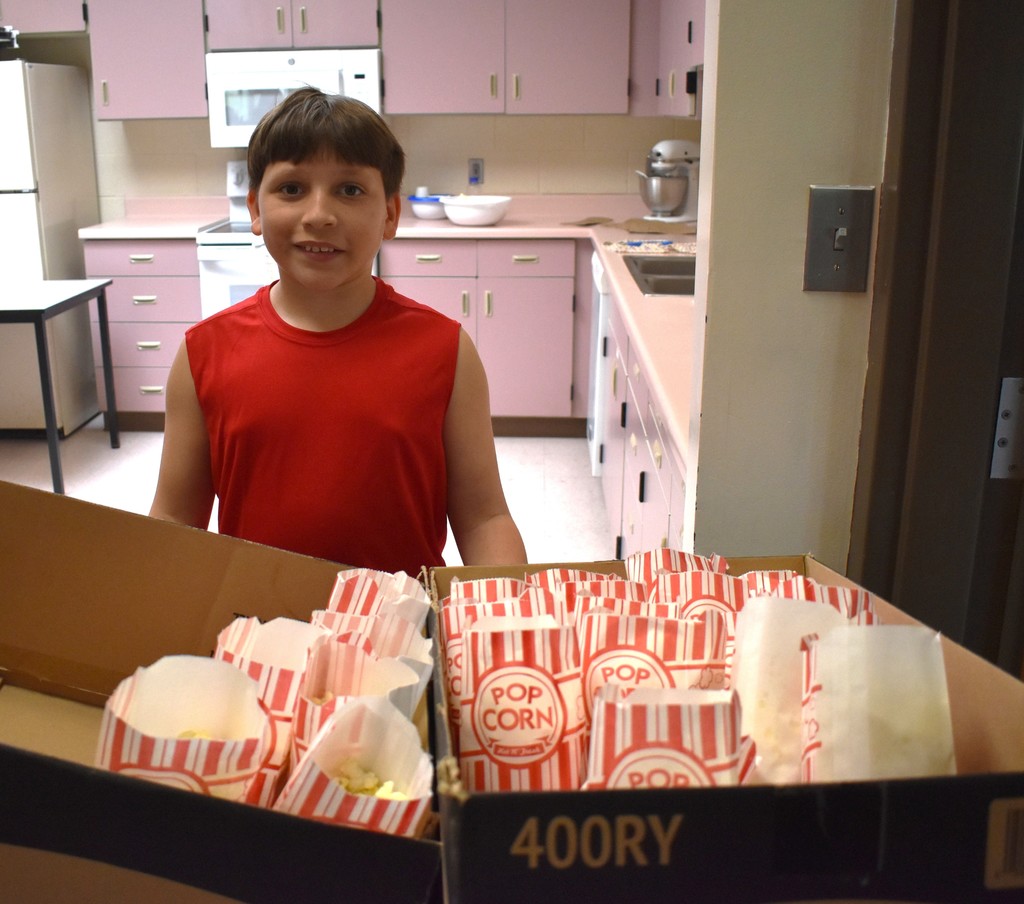 student with popcorn