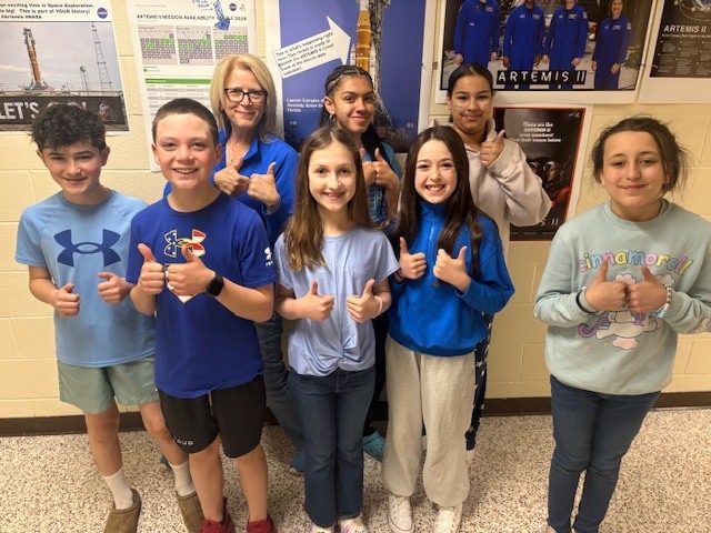 students in blue