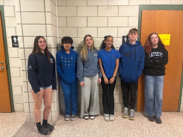students in blue