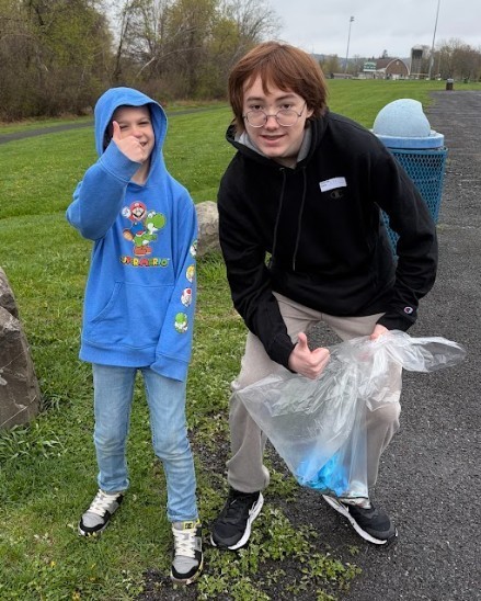 students cleaning park