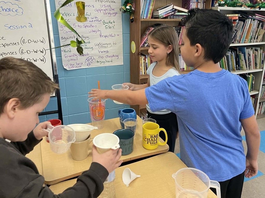 students measuring items