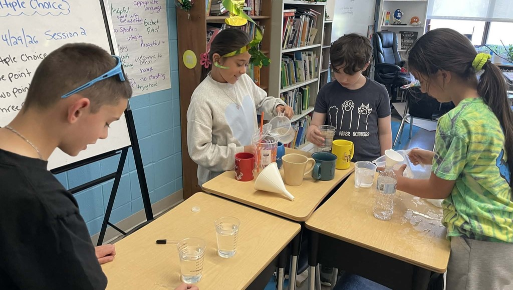 students measuring items