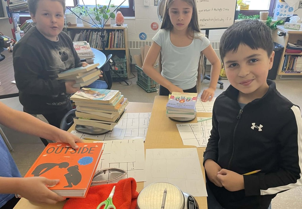 students measuring items