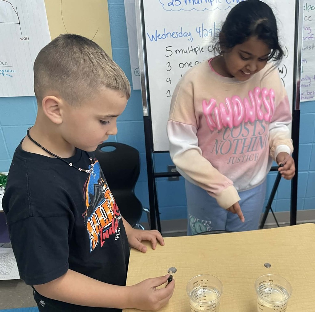 students measuring items