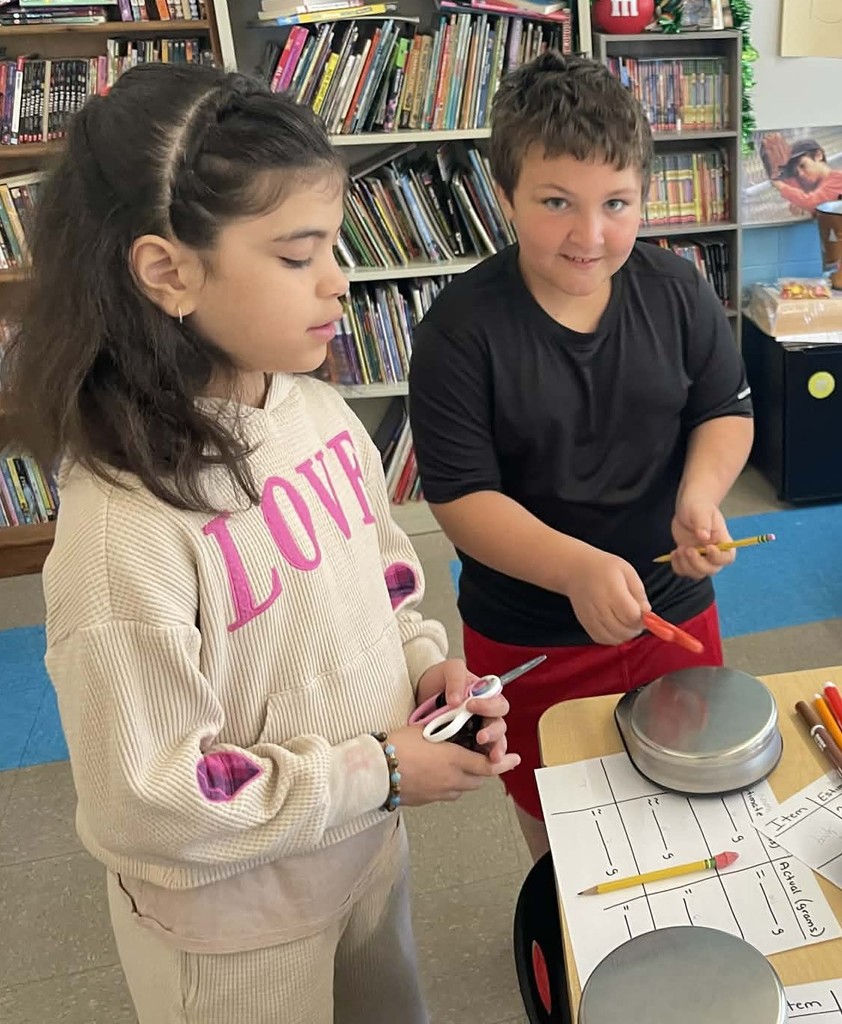students measuring items
