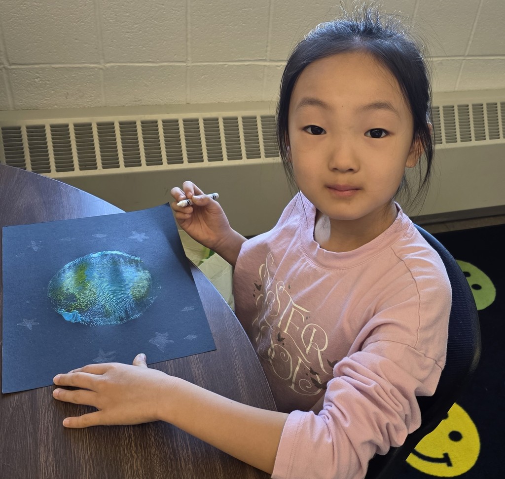student with artwork