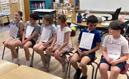 students in chairs