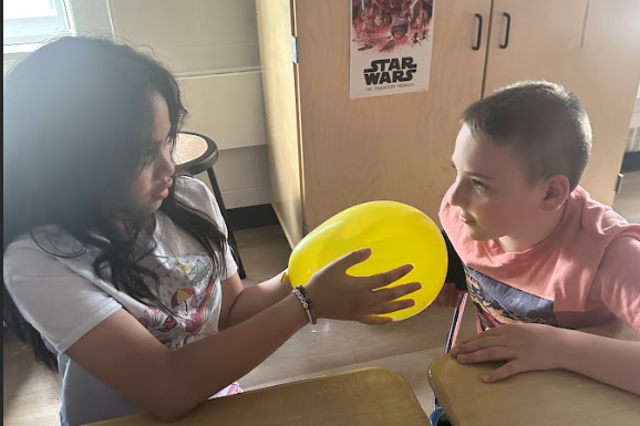 students with ballons