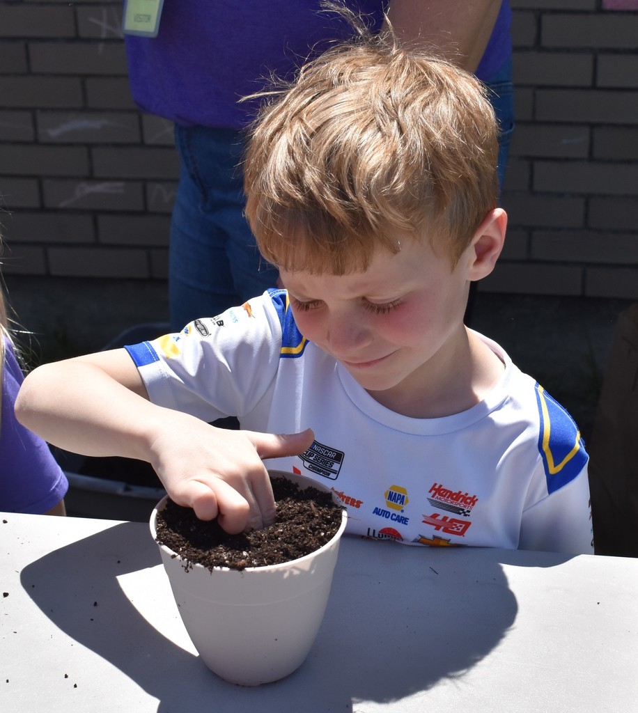 student planting