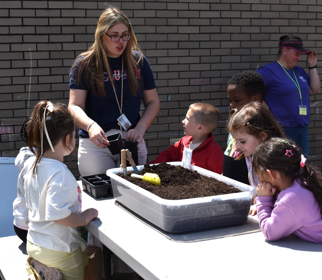 teacher with students outside
