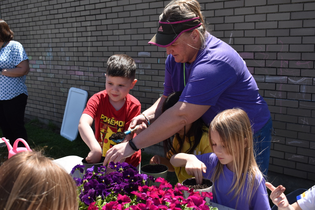 students planting