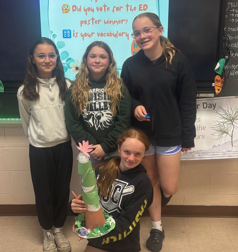 students with paper trees