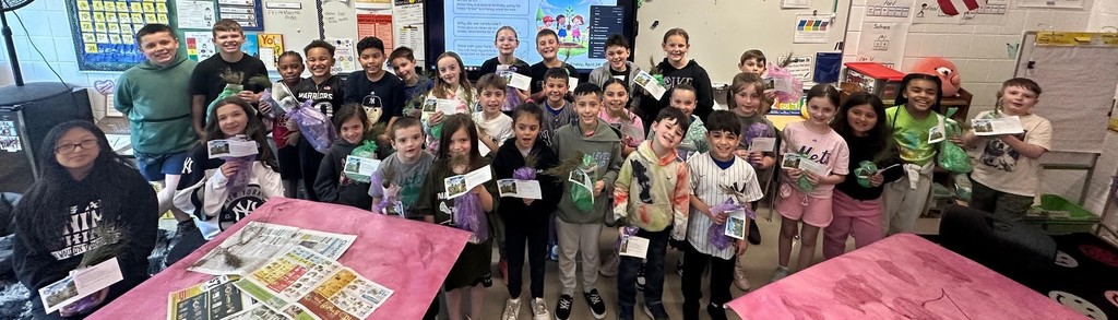 students with baby trees