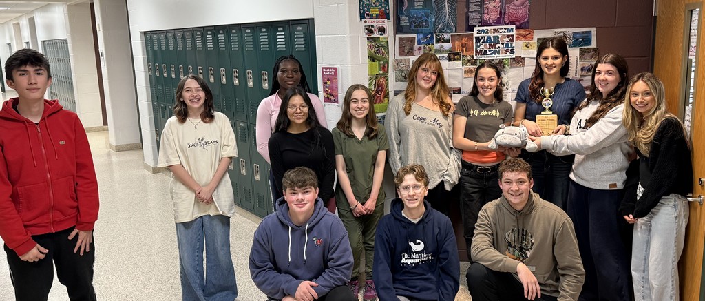 students by a bulletin board