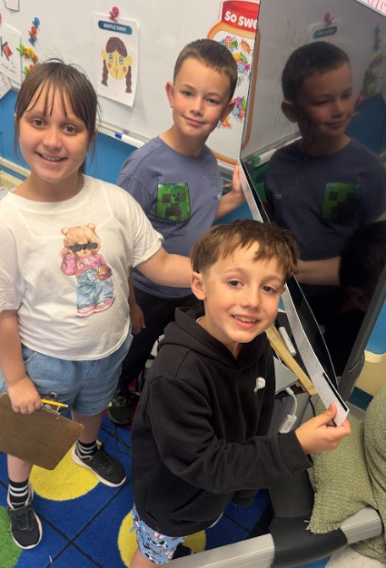 students with measurement tools