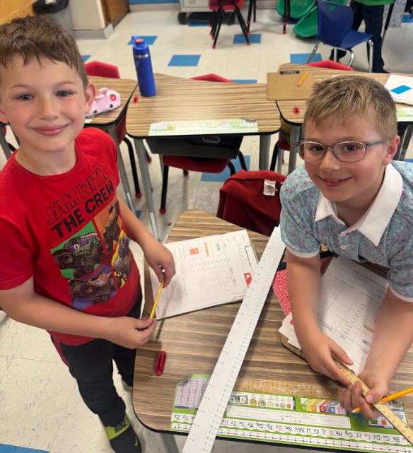 students with measurement tools
