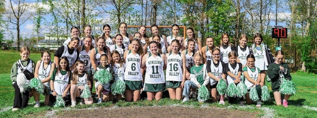 lacrosse team with younger players