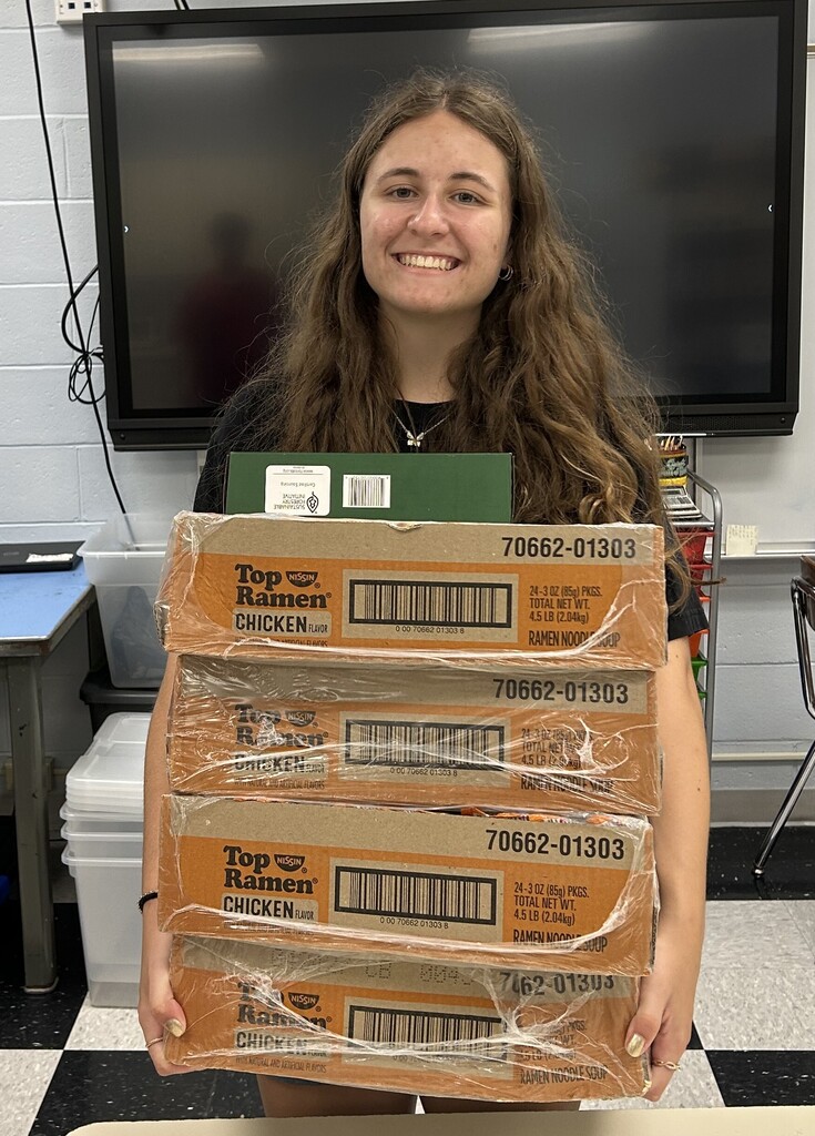 student with collected food