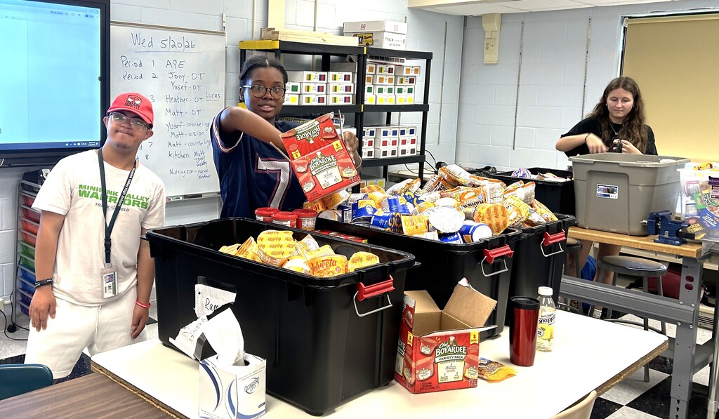 students with collected food