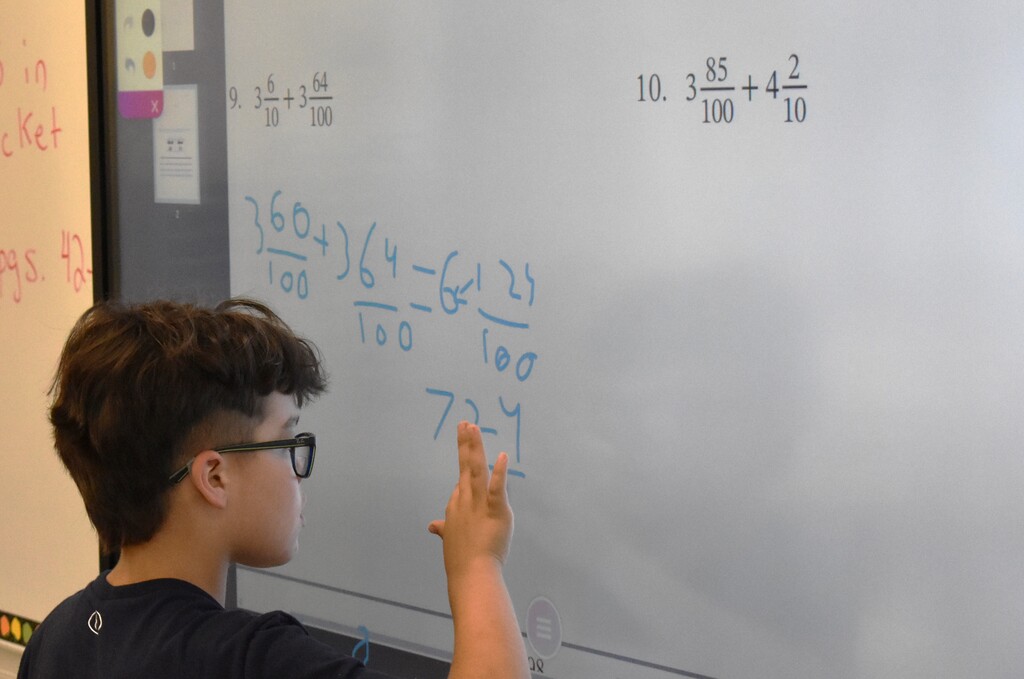 student in math class