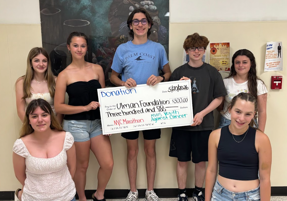students with a check