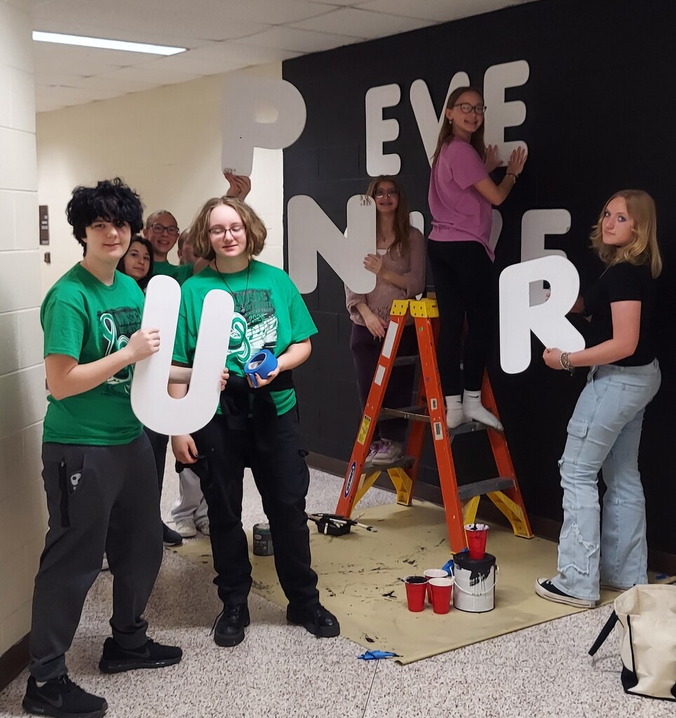 students with mural