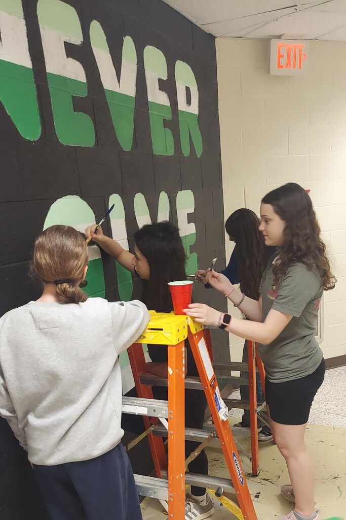 students with mural