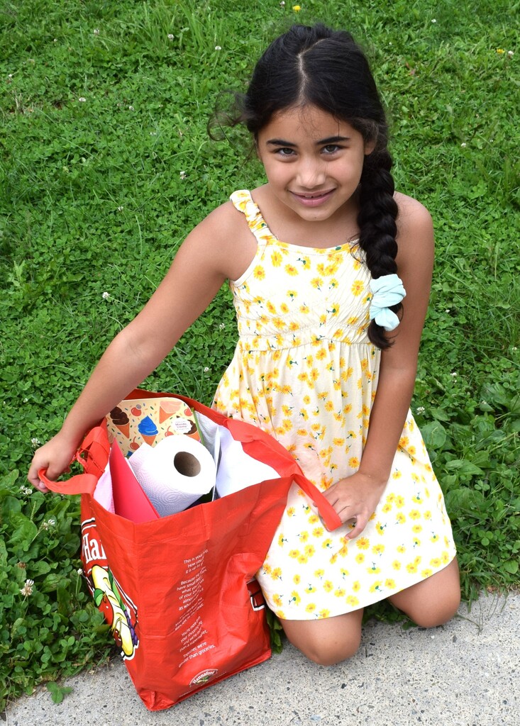 girl with school supplies