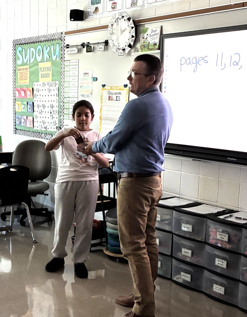 teacher with card trick