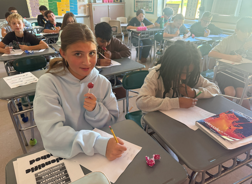students with lolly pops