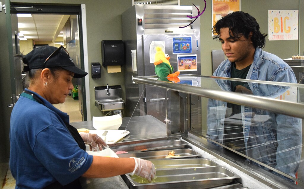student with food