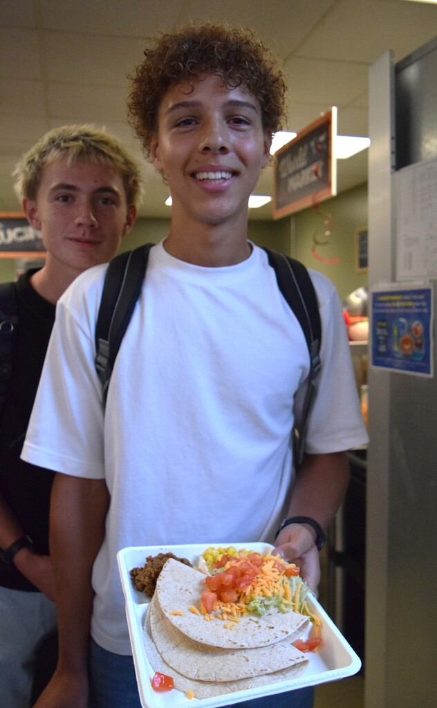 student with food