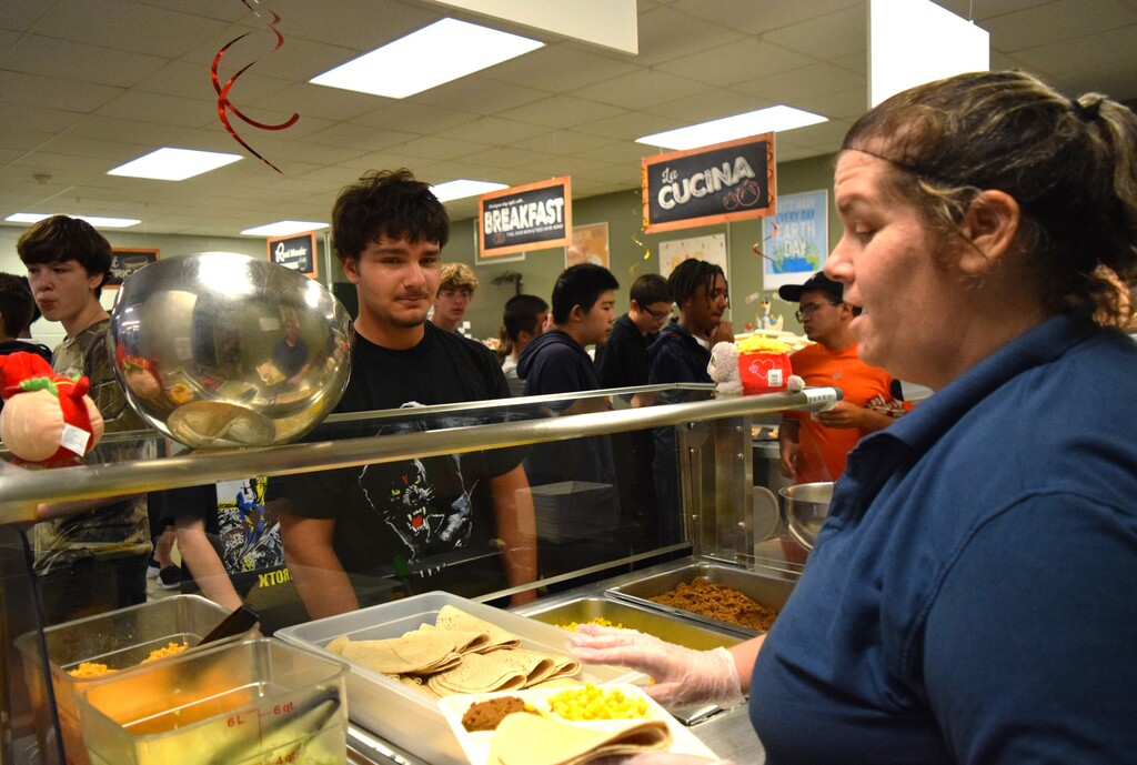 student with food
