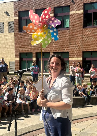 teacher with pinwheel